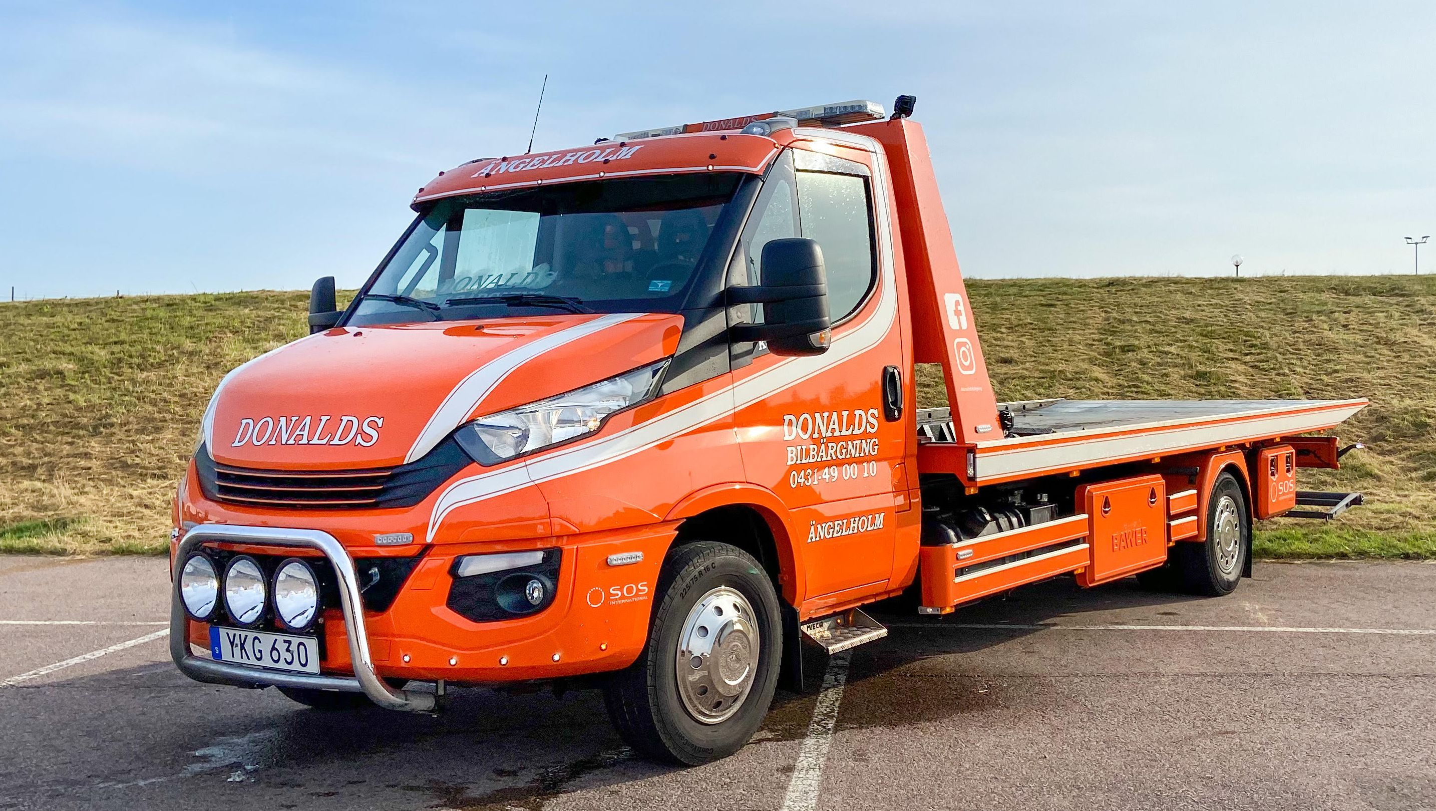 Flakbärgare hos Donalds Bilbärgning - Bärgningsbil i skåne